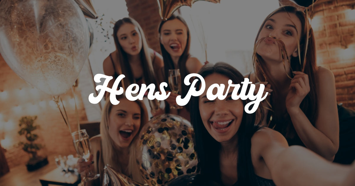 bold white text saying hens party overlaying an image of group of young women taking selfie