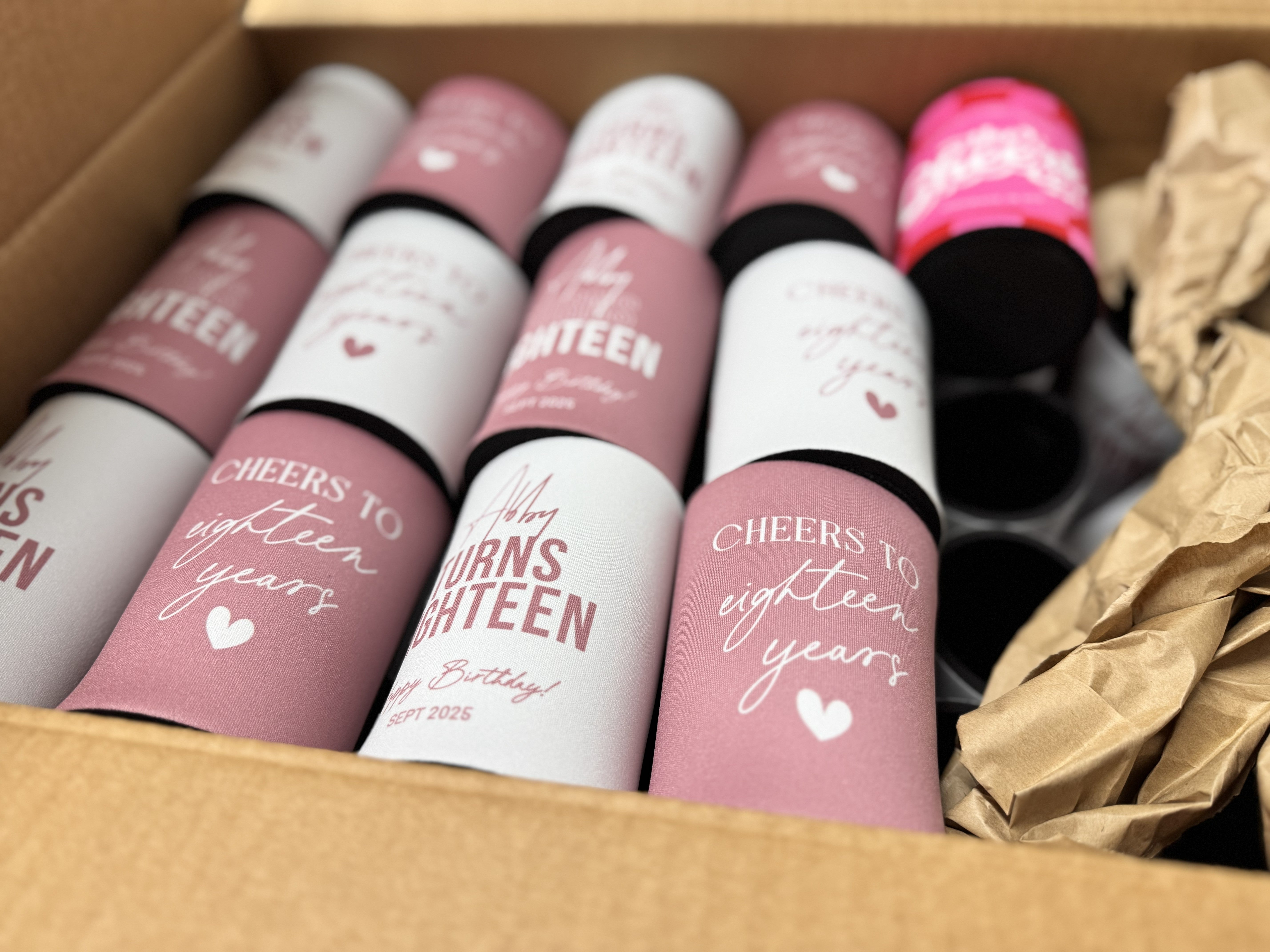 set of completed stubby holders layed out in a shipping box